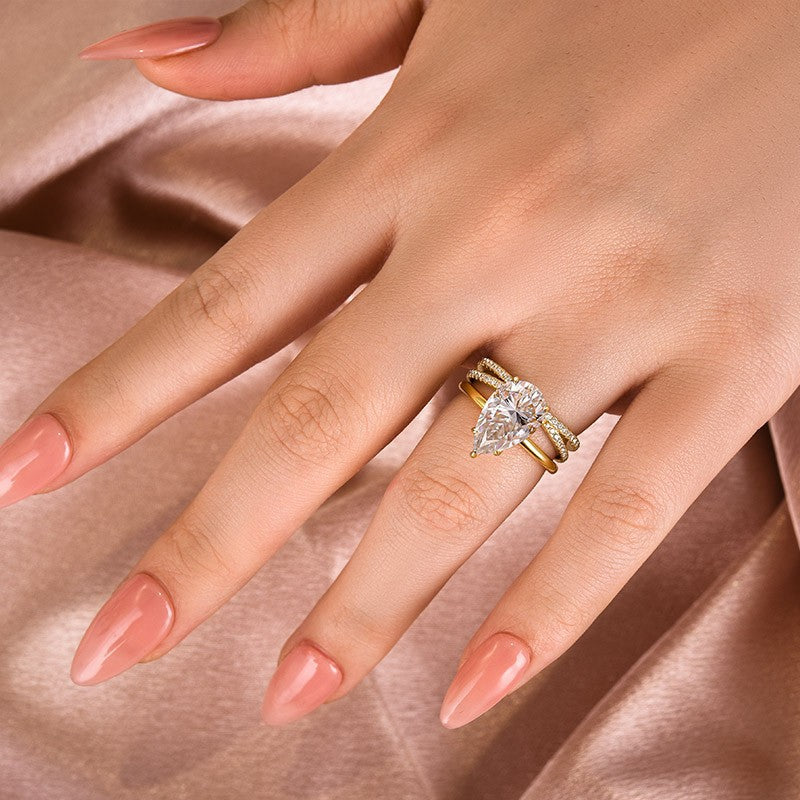 Moissanite 4.0 Ct Pear Cut Yellow Gold Wedding Ring With X Criss Cross Wedding Band