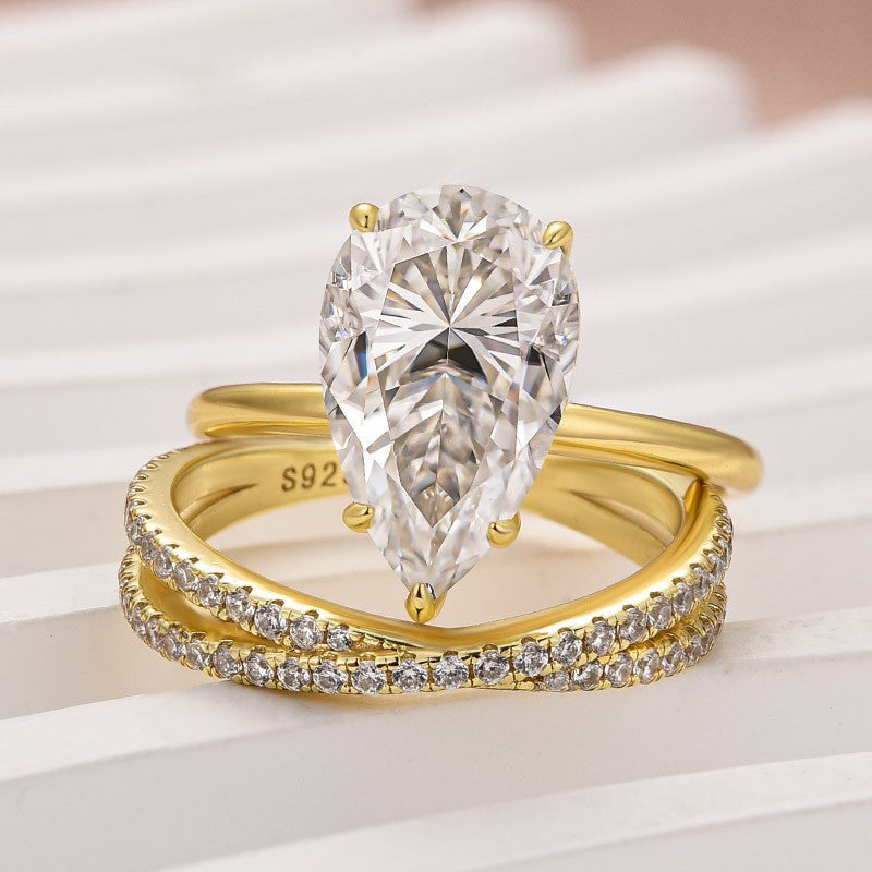 Moissanite 4.0 Ct Pear Cut Yellow Gold Wedding Ring With X Criss Cross Wedding Band