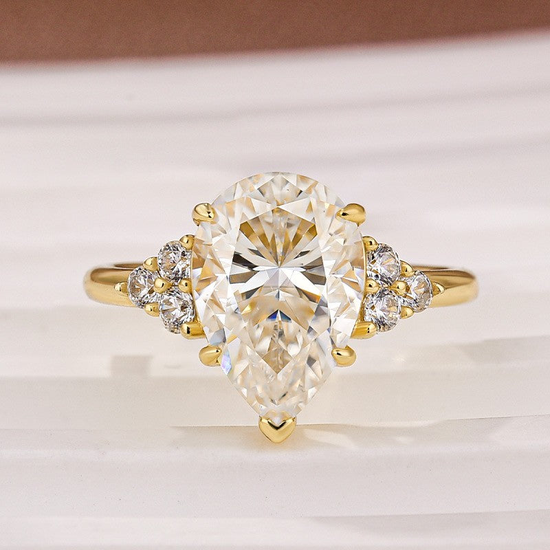 Gelovely Moissanite 3.0 Ct Pear Cut Yellow Gold Engagement Ring with Round Cut Side Stone